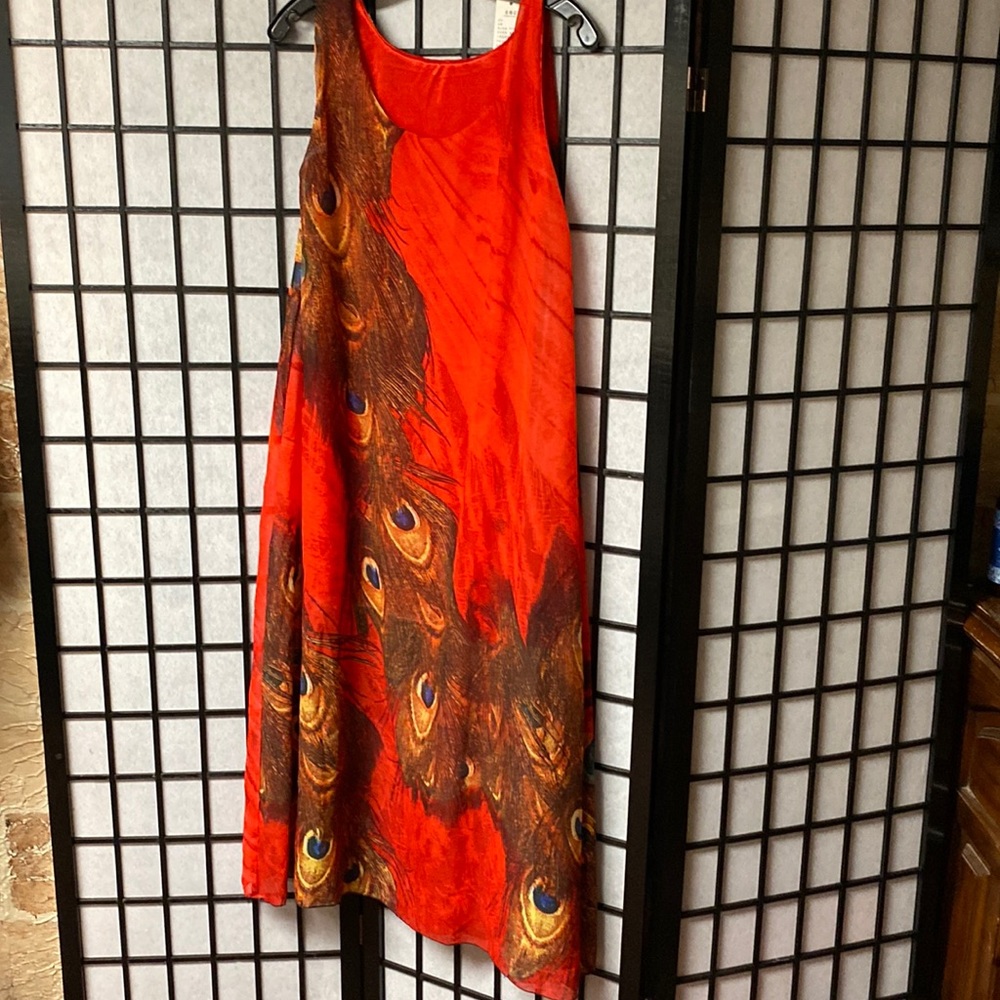 Beautiful maxi dress super super light fully lined to the knees. One size.